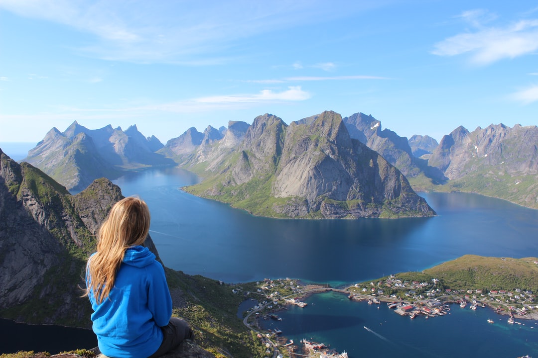 A body of water with Lofoten in the background