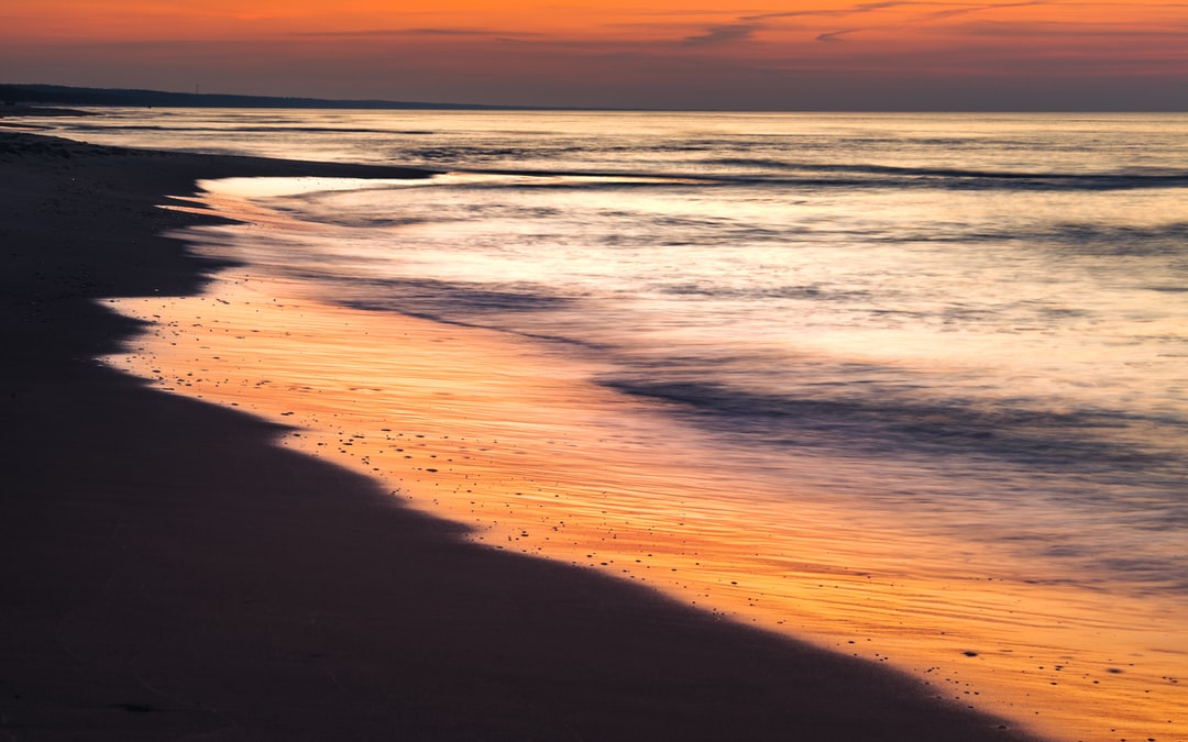 A sunset over a beach