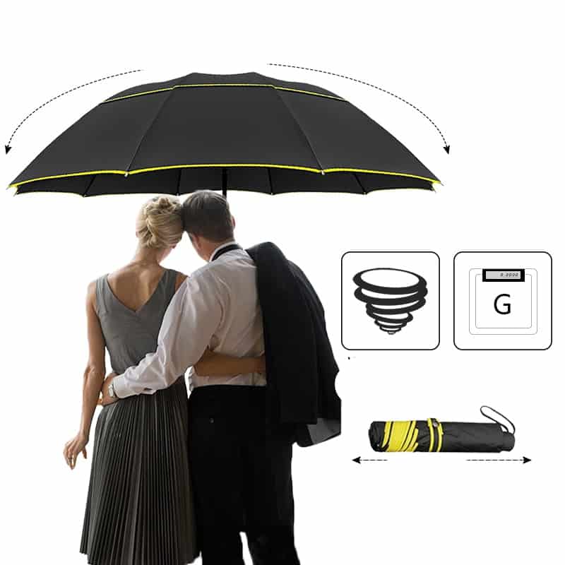A person that is standing in the rain holding an umbrella